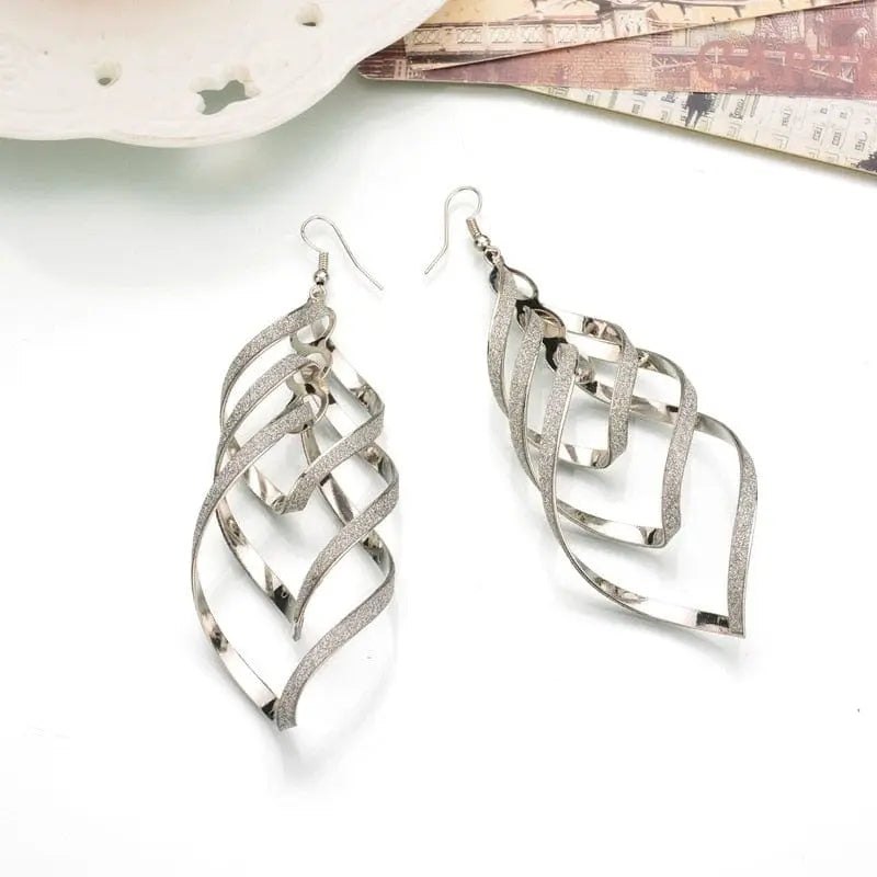 Frosted resin and metal bohemia tassel drop earrings for women, stylish and trendy jewelry accessory.