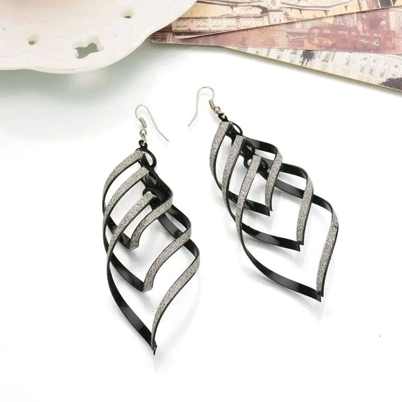 Bohemia Frosted Tassel Drop Earrings for Women with resin and metal, featuring long, trendy, and stylish jewelry design.