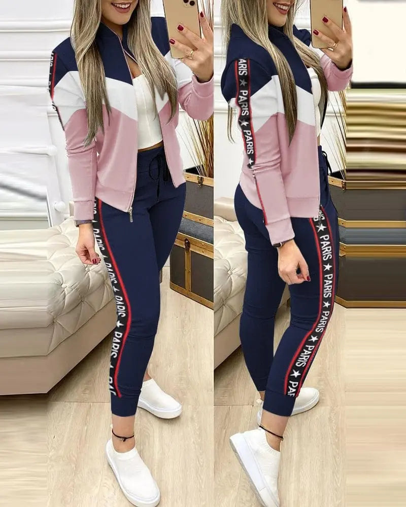 Showlu Fashion Women's leopard two-piece tracksuit with zipper top and matching leggings, stylish activewear for women.