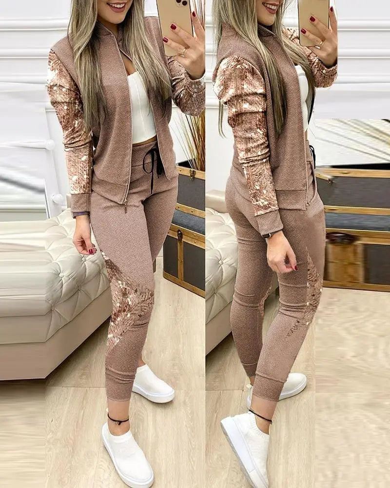 Showlu Fashion Leopard women's two-piece tracksuit with zipper top and matching leggings, stylish activewear for women.