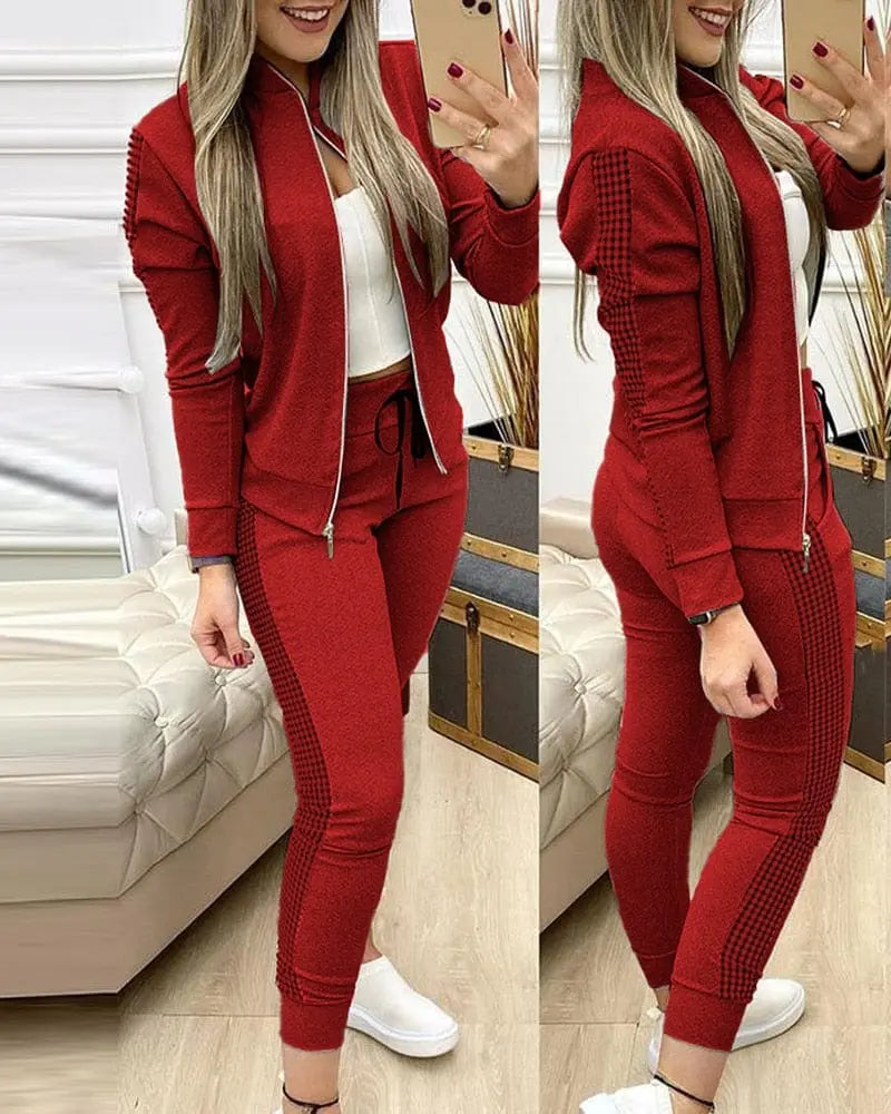 Showlu Fashion Women's leopard two-piece tracksuit with zipper top and matching leggings, stylish activewear set for women.