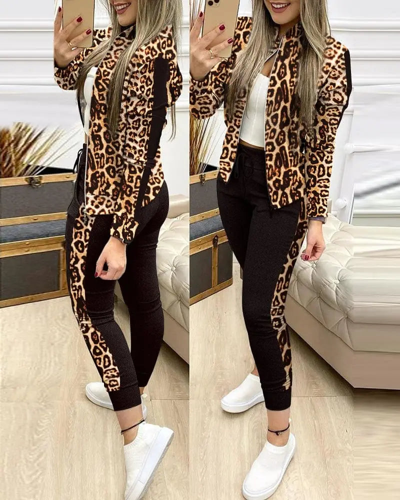 Showlu Fashion Women's leopard two-piece tracksuit with zipper top and leggings, stylish activewear for women.