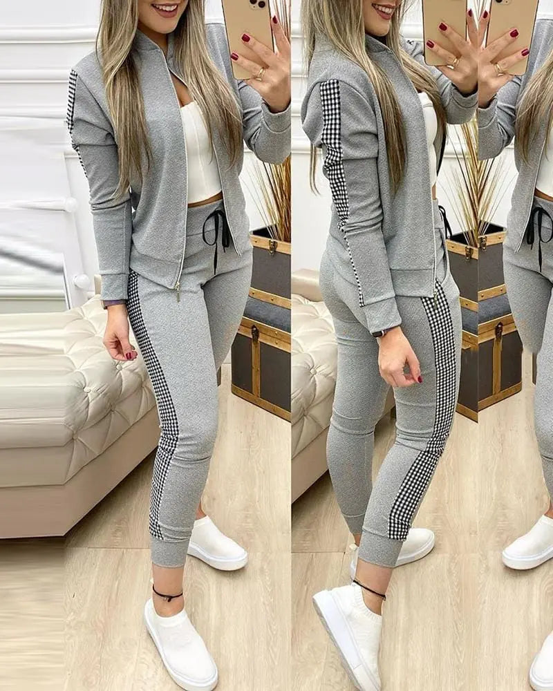 Women’s leopard print two-piece tracksuit with zipper top and leggings from Showlu Fashion Store, activewear for women.