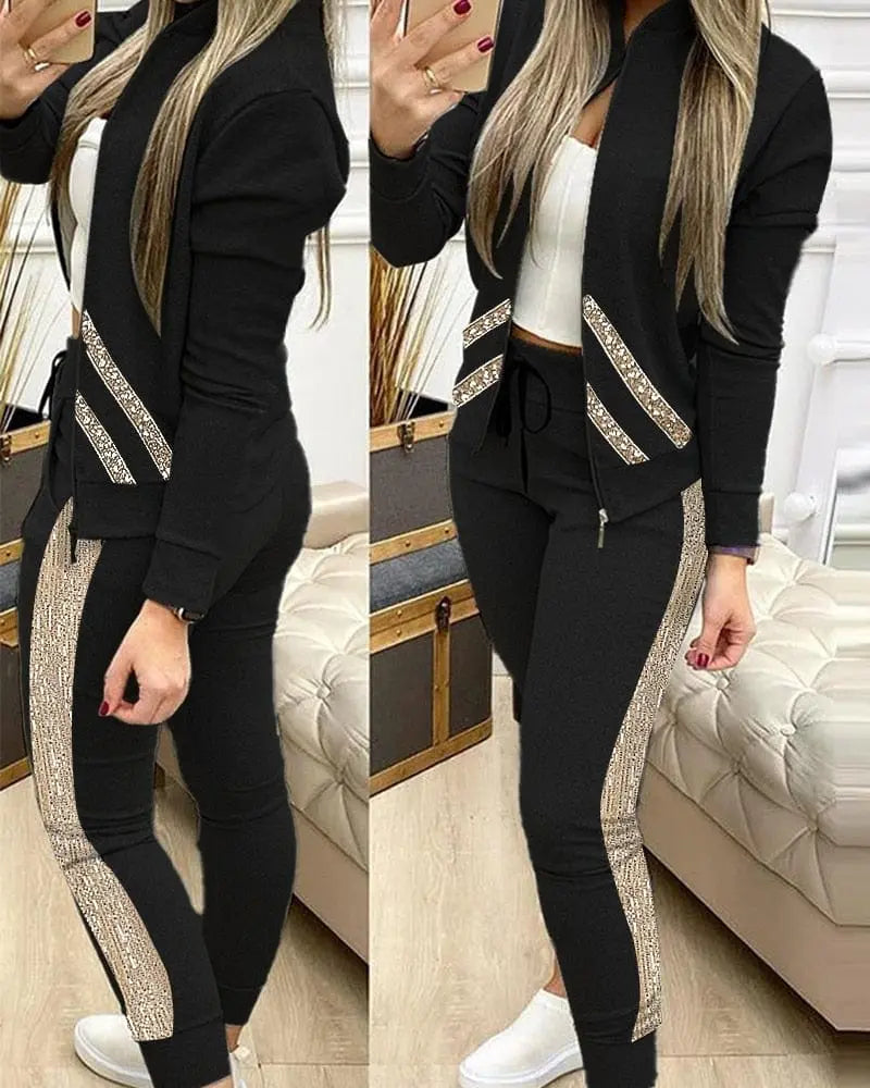 Showlu Fashion Women's leopard two-piece tracksuit with zipper top and matching leggings, stylish activewear for women.