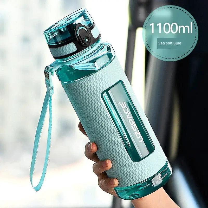 Showlu Fashion Store 1L Tritan sports water bottle, large capacity, leakproof, high-temperature resistant plastic cup for fitness and summer use.