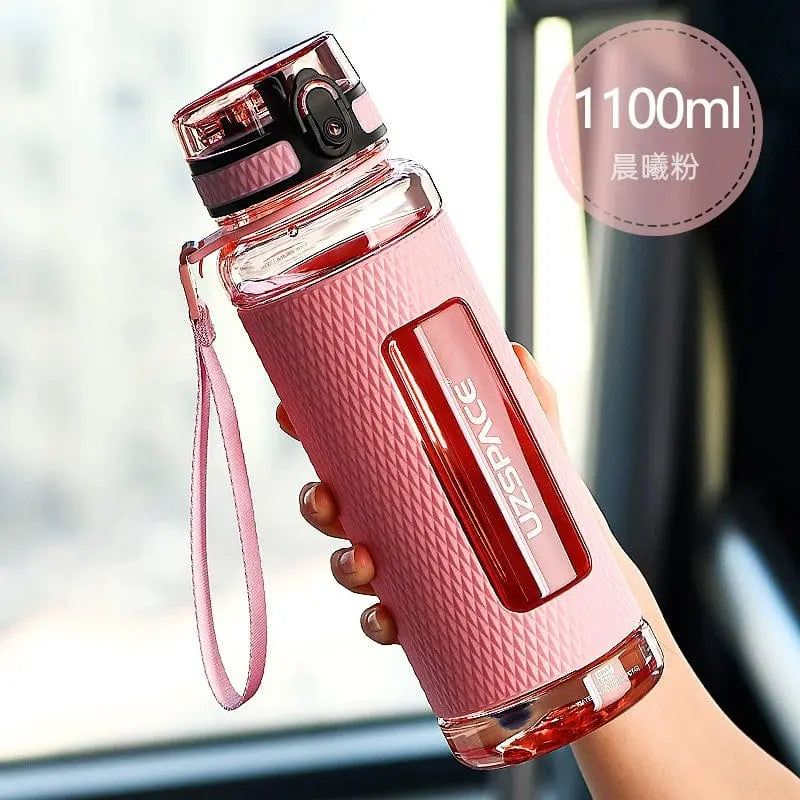 Showlu Fashion Store Uzspace Tritan 1L large capacity sports water bottle, leakproof, high-temperature resistant plastic, ideal for fitness.