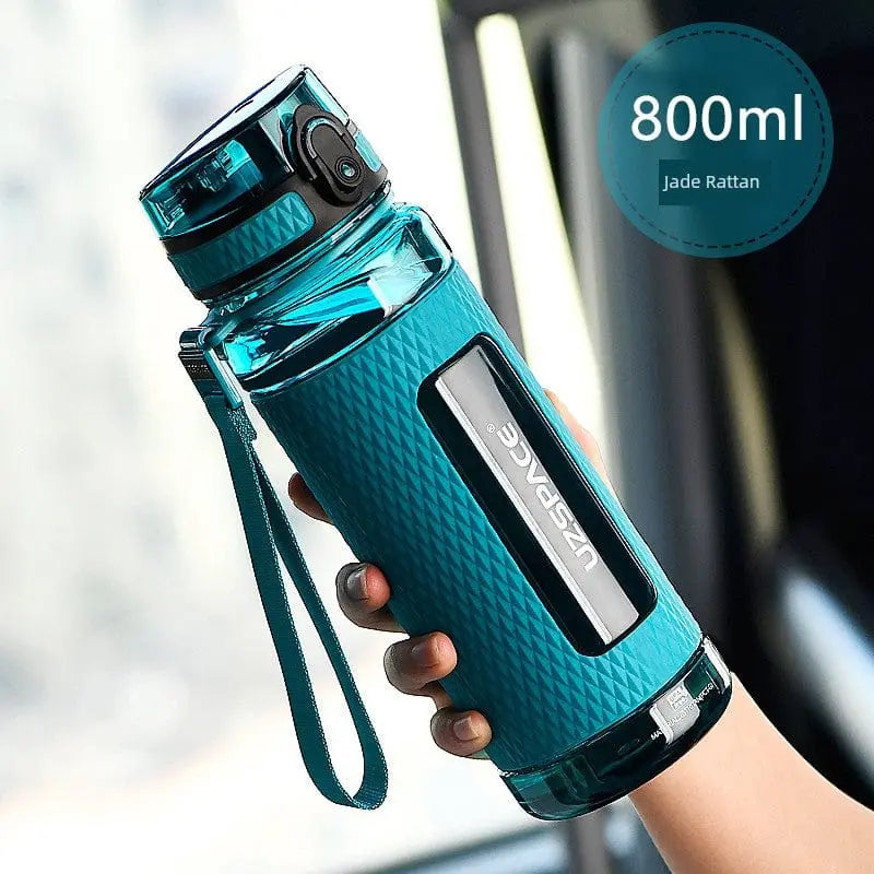 Showlu Fashion Uzspace 1L Tritan sports water bottle with leakproof design, high-temperature resistant plastic, ideal for fitness and summer use.