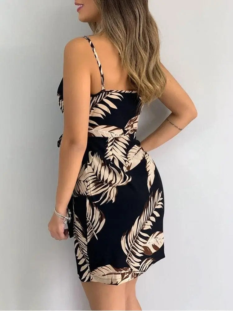 Women's tropical print V-neck wrap mini summer beach dress with sleeveless design, casual style, perfect for holiday and warm weather.