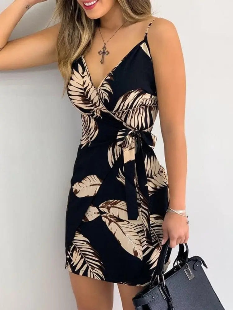 Women's tropical print V-neck wrap mini summer beach dress with sleeveless design and casual style by Showlu Fashion Store
