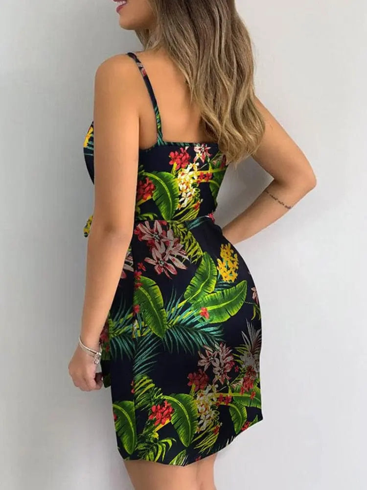Women's tropical print V-neck wrap mini summer beach dress with sleeveless design, casual and perfect for warm weather.