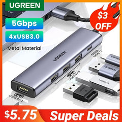 A silver UGREEN USB-C hub with four USB 3.0 ports and a metallic finish.