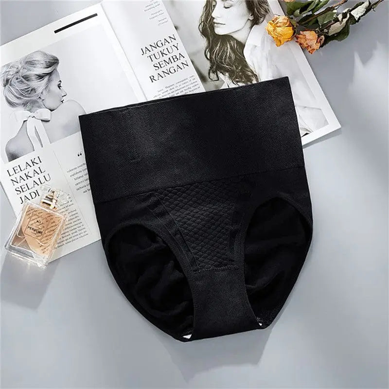 Showlu women's high waist tummy tuck shapewear thong in nude, made of spandex, designed for body shaping and tummy control.