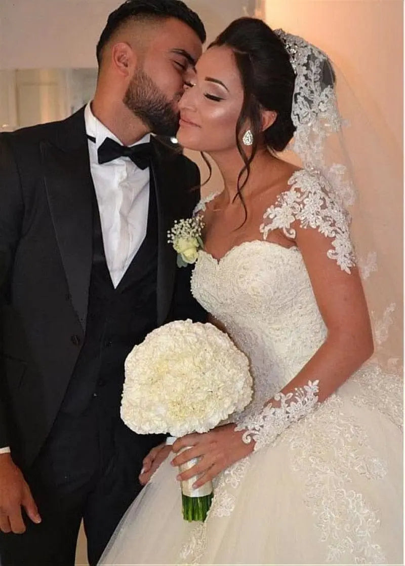 Long sleeve tulle wedding dress by Showlu Fashion Store, elegant ball gown bridal gown for special occasions.