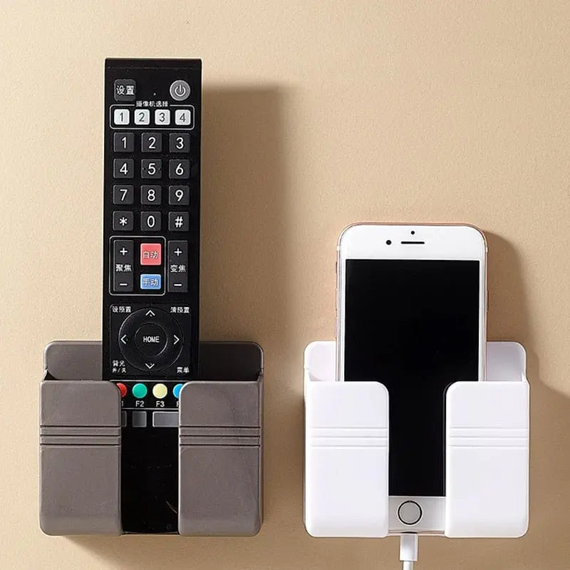 Wall-mounted Showlu mobile phone holder and charging stand with punch-free design, ideal for hands-free phone use and charging.