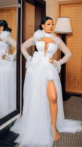 White YiMinpwp high neck tulle wedding dress with long sleeves, A-line silhouette, side split, train, and cut-out details.