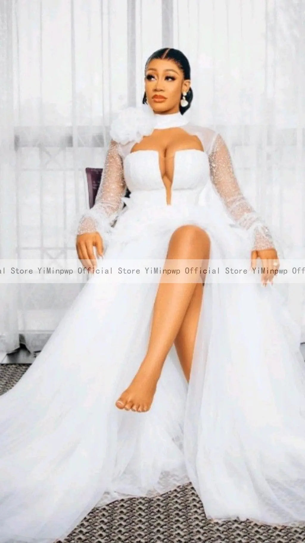 Elegant white high neck tulle wedding dress by Showlu Fashion with long sleeves, A-line silhouette, side slit, and sweep train.