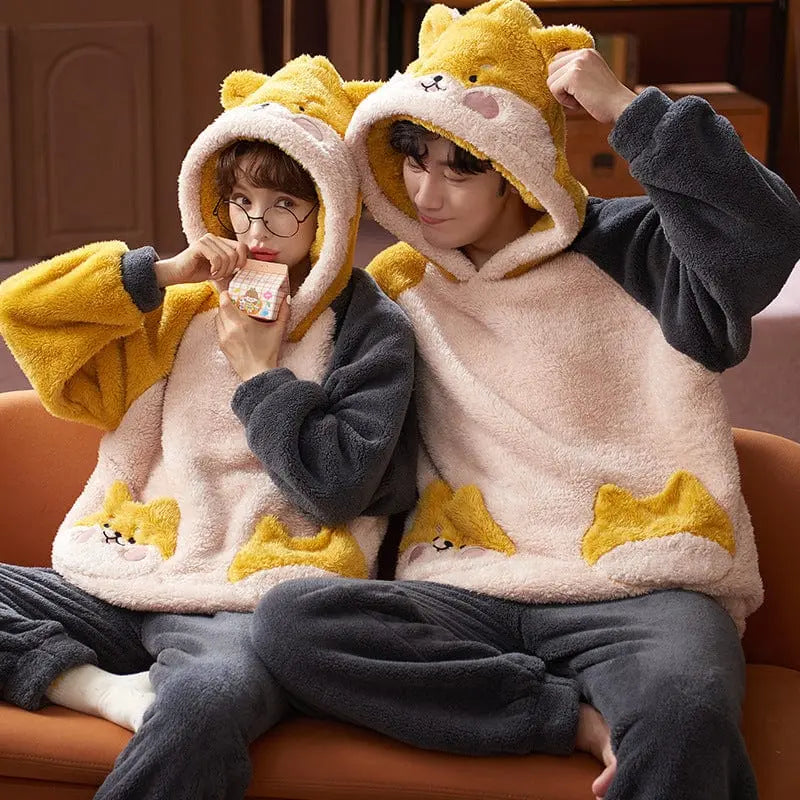 Unisex cartoon velvet flannel pajamas set for adults featuring cute, colorful cartoon designs and cozy sleepwear for men and women.