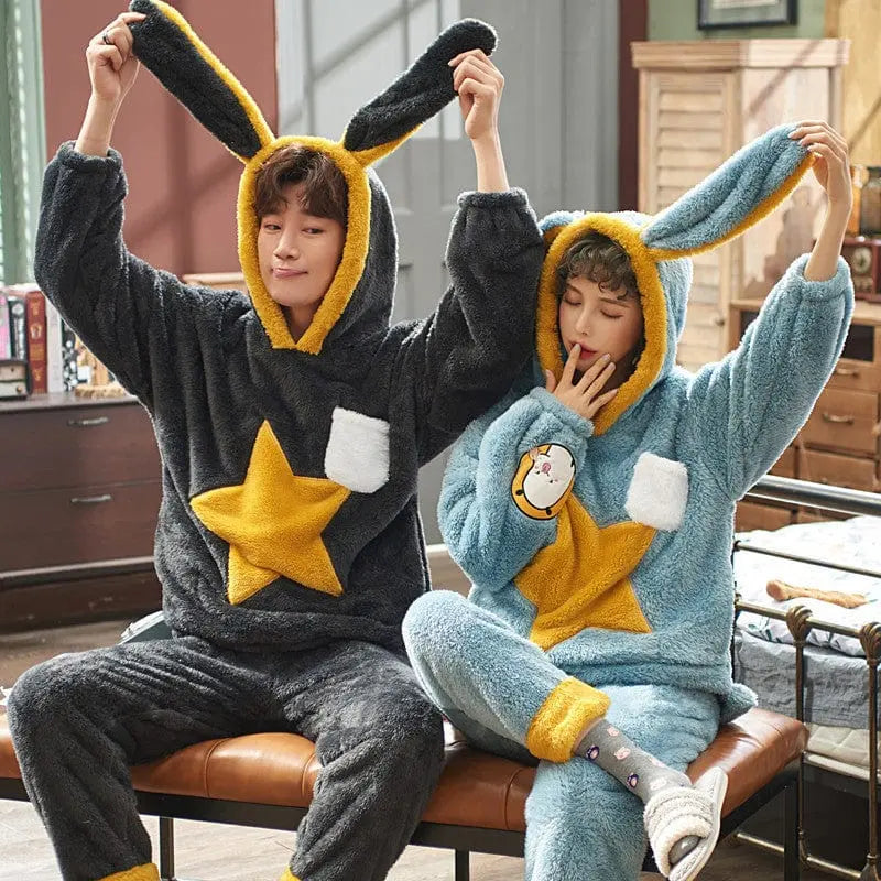 Unisex cartoon velvet flannel pajamas set for adults featuring a cute, colorful cartoon design, perfect for cozy sleepwear.