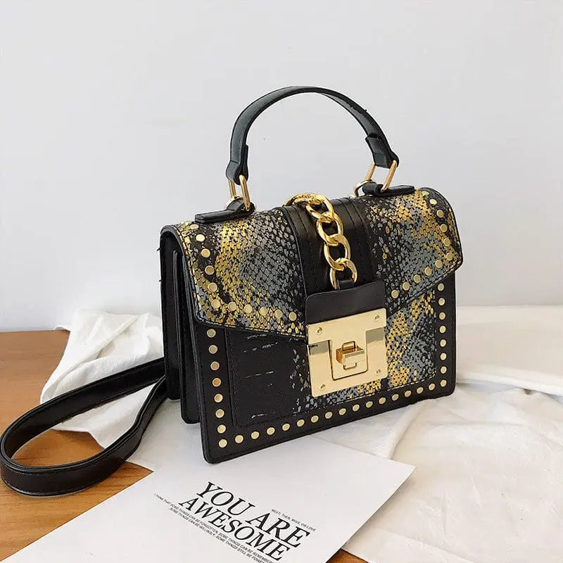 Showlu snakeskin PU leather women's handbag with designer lock, crossbody style, shoulder strap, and stylish purse design.