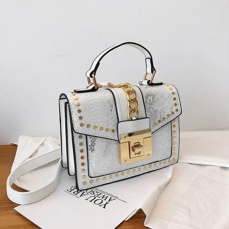 Showlu snakeskin PU leather women's handbag with designer lock, crossbody style, featuring a sleek shoulder bag design.