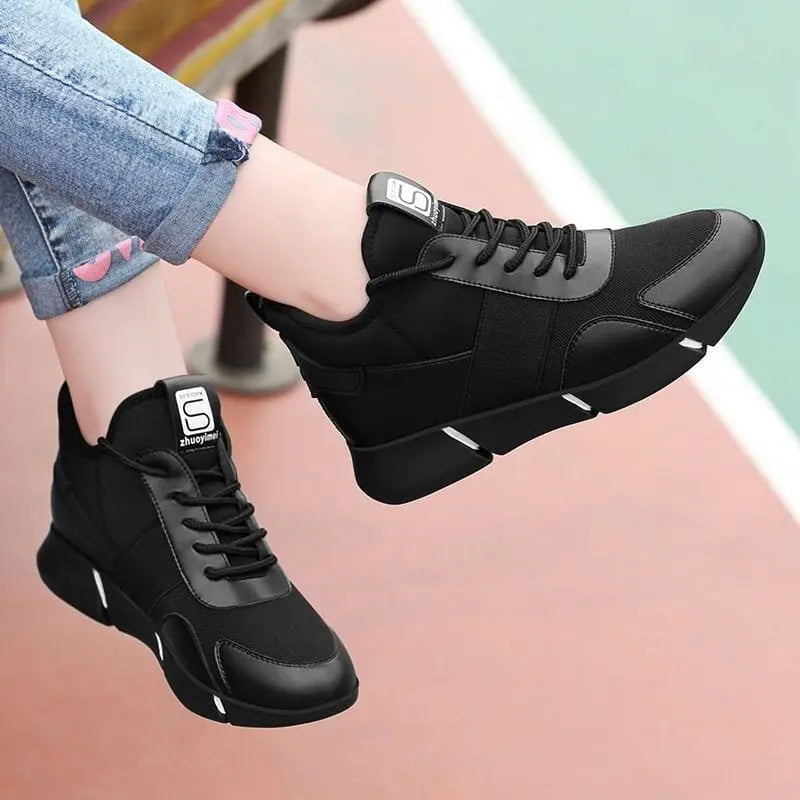Showlu Women's black casual sport sneakers with breathable mesh upper, comfortable design, suitable for running and everyday wear
