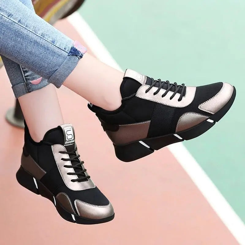 Showlu women's black casual sport sneakers with breathable mesh upper, suitable for running and everyday comfort.