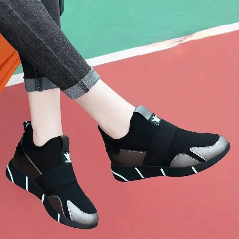 Showlu women's black casual sport sneakers with breathable mesh uppers, designed for comfort and everyday active wear.