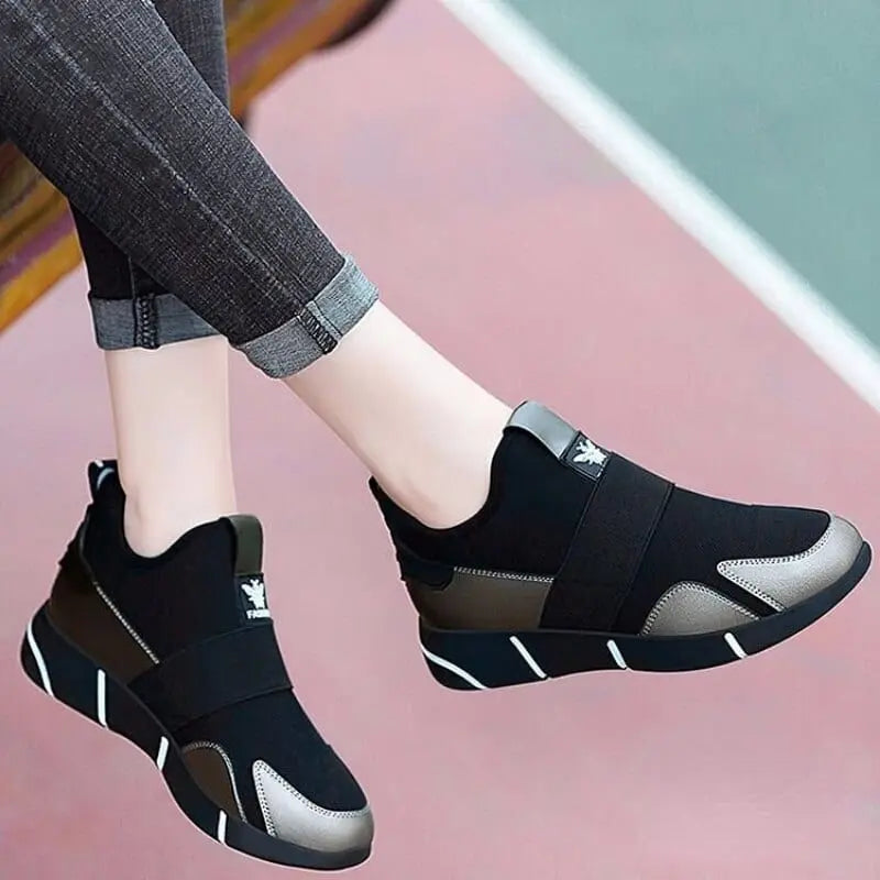 Showlu women's black casual sport sneakers with breathable mesh upper and comfortable design for everyday active wear.