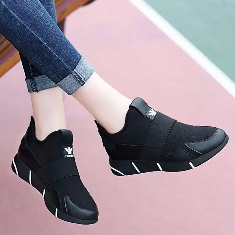 Showlu women's black casual sport sneakers with breathable mesh upper and comfortable design for running and everyday wear.
