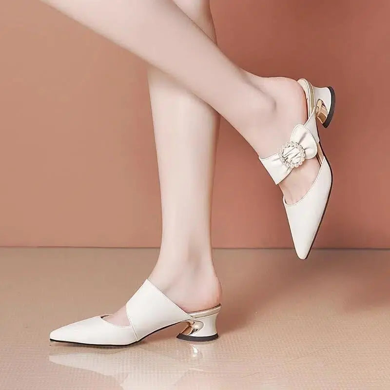 Beige pointed toe stiletto pumps for women by Showlu Fashion Store, stylish high heels with slip-on design and elegant appearance.