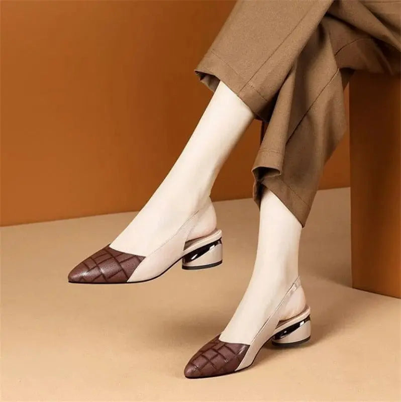 Beige pointed toe stiletto pumps for women by Showlu Fashion Store, featuring classic high heel design and sleek slip-on style.