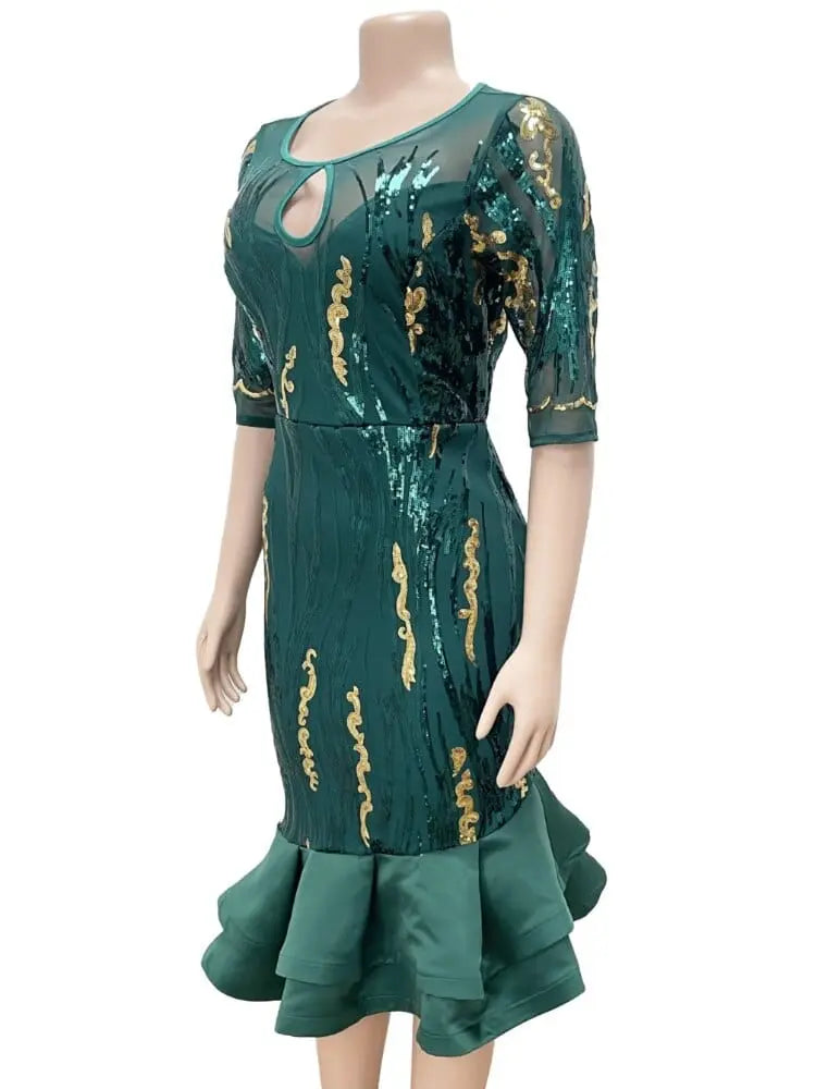 A woman wearing a sequined mesh African-style evening sheath dress with three-quarter sleeves, perfect for parties and celebrations.