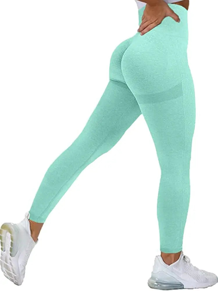Women wearing black MEHEOL seamless high waist workout leggings with booty lifting design, suitable for gym and active wear.