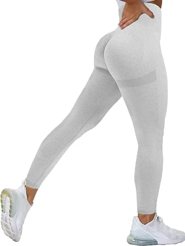 Women wearing black MEHEOL seamless high waist workout leggings with a push-up design, ideal for gym and active wear.