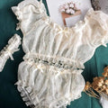 Women’s sheer star ruffle pajama set by Anel Demosthene, featuring off-shoulder tops and matching shorts with delicate ruffles.