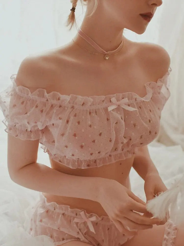 Women’s sheer star ruffle pajama set by Anel Demosthene, includes off-shoulder tops and shorts with delicate gauze details.