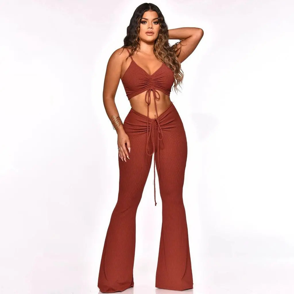 Women’s two-piece summer outfit with nylon tank top and long pants by Showlu Fashion, styled for casual warm-weather wear.