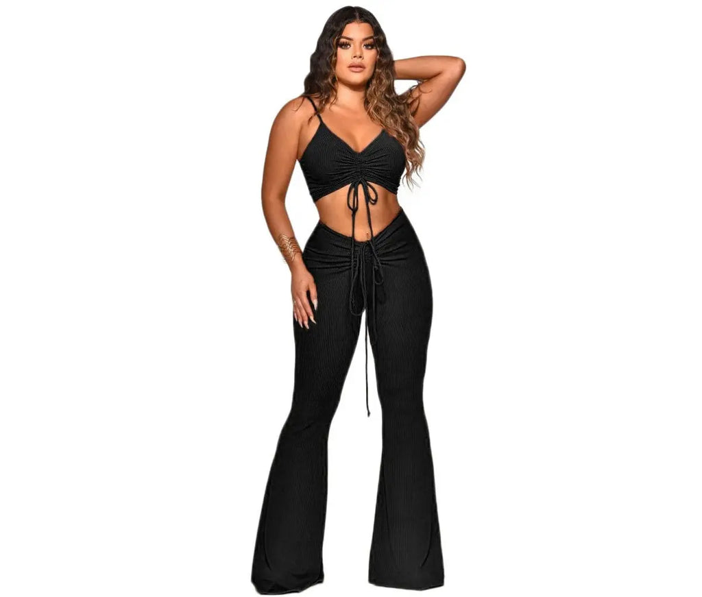 Women’s two-piece summer outfit set with nylon tank top and long pants from Showlu Fashion, styled for warm weather.