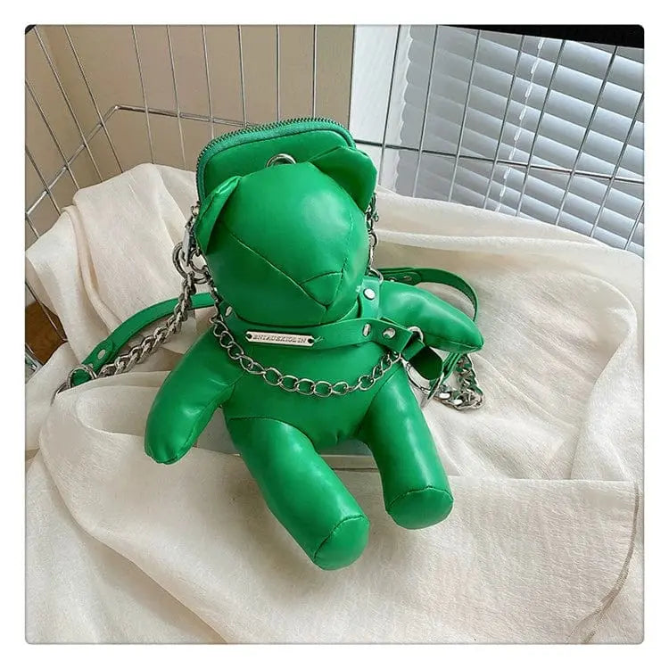 Dolan women's animal shape bucket bag in PU leather with chain shoulder strap, featuring a playful hot girl doll design.