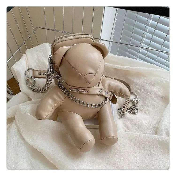 Dolan women's animal shape bucket bag in PU leather with chain shoulder strap, stylish tote bag feature.