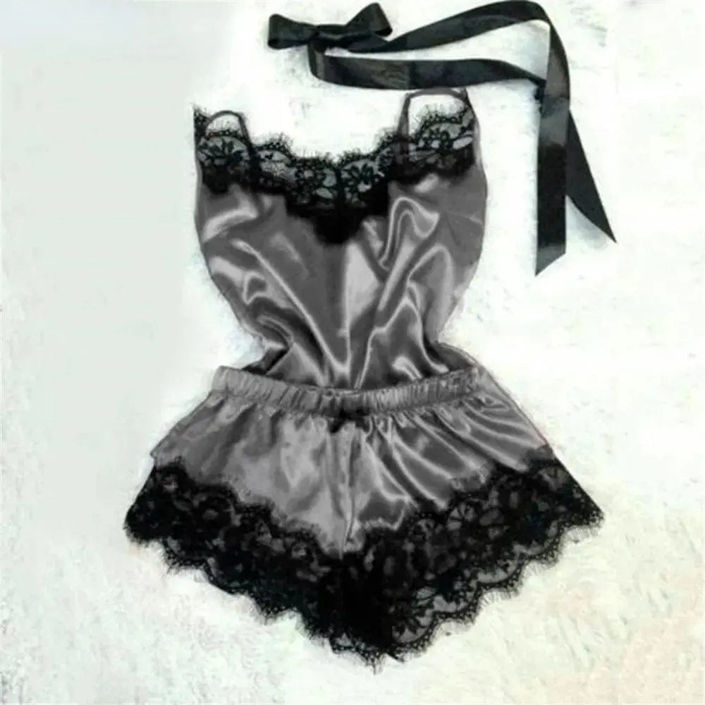 Sexy lace satin pajama set for women featuring a V-neck sleeveless top and matching shorts, stylish sleepwear by Showlu Fashion.