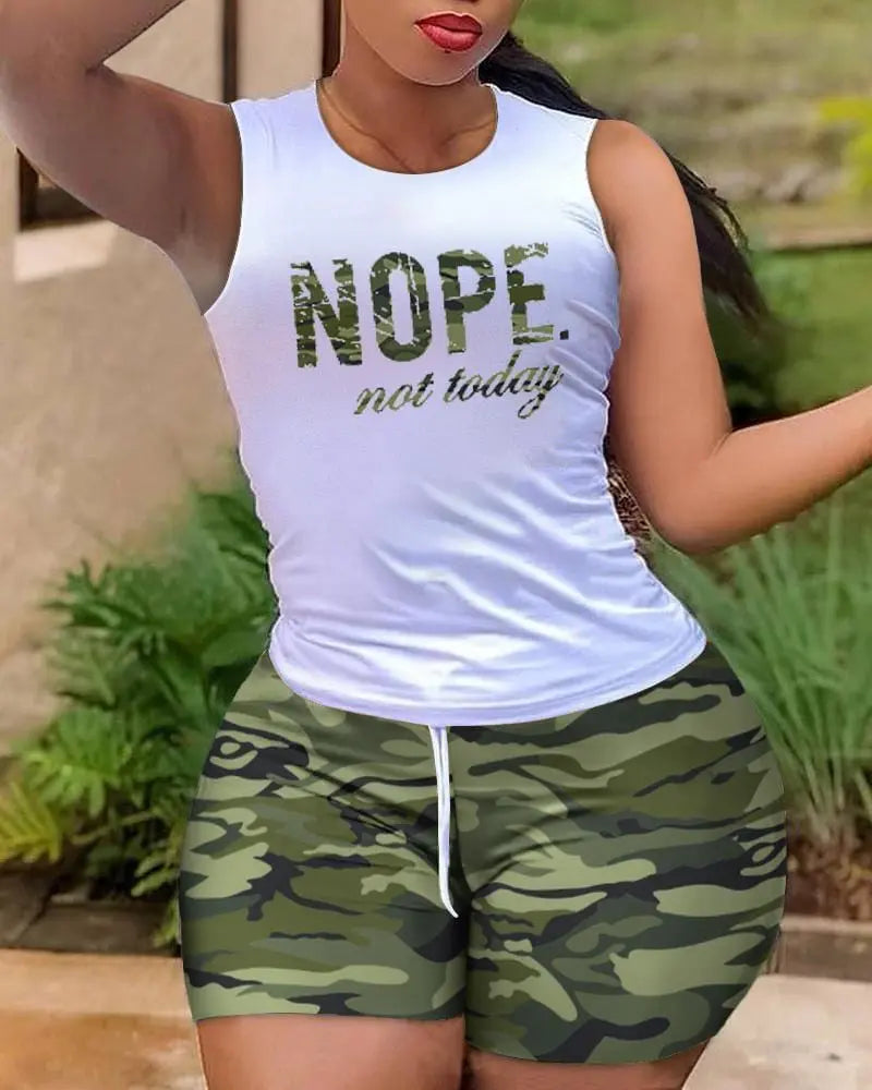 Owner Girl women's two-piece print set with quick-dry sports top and shorts, perfect for casual fitness and summer activities.