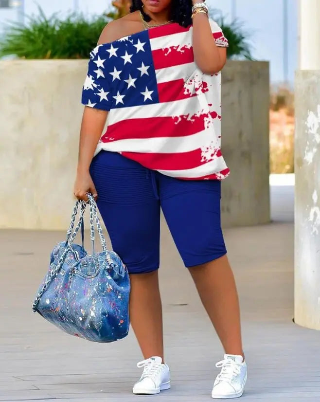 Women's two-piece shorts set by Anel Demosthene with melting colors print, skew neck top and matching shorts for summer casual wear.