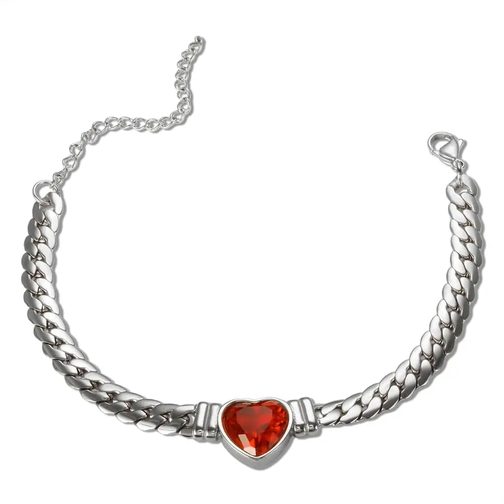 Gold-plated stainless steel heart necklace and nail bracelet set with chain design, stylish jewelry for women.