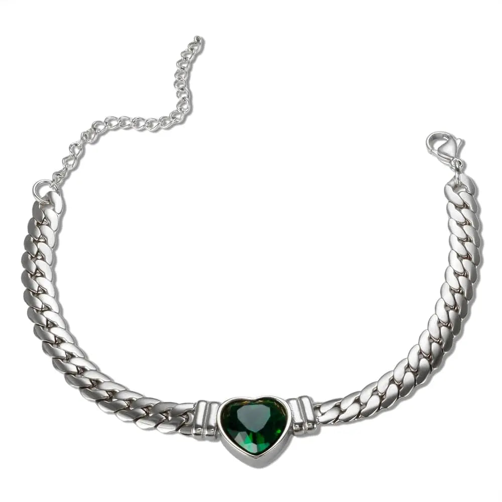 Gold-plated stainless steel heart necklace and nail bracelet set featuring a luxury love heart chain for women.
