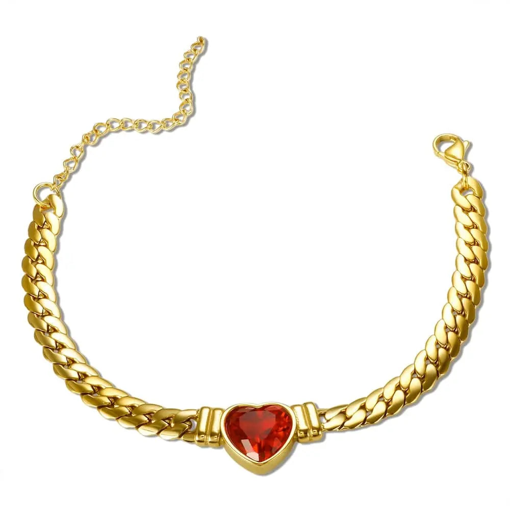 Gold-plated stainless steel heart necklace and nail bracelet set featuring elegant chain links, stylish jewelry for women.