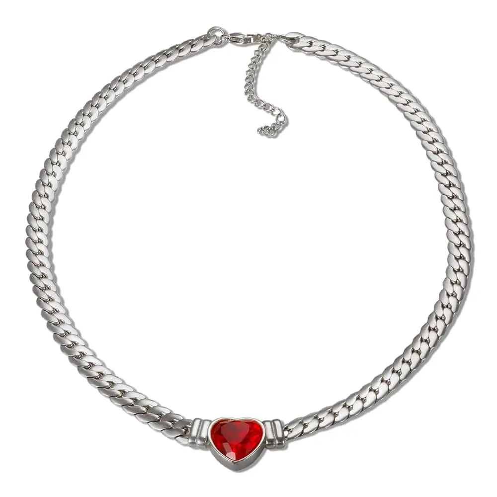 A silver-toned chain necklace featuring a central red heart-shaped pendant.