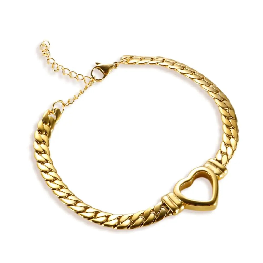 Gold-plated stainless steel heart necklace and nail bracelet set with luxury love design, perfect for women.