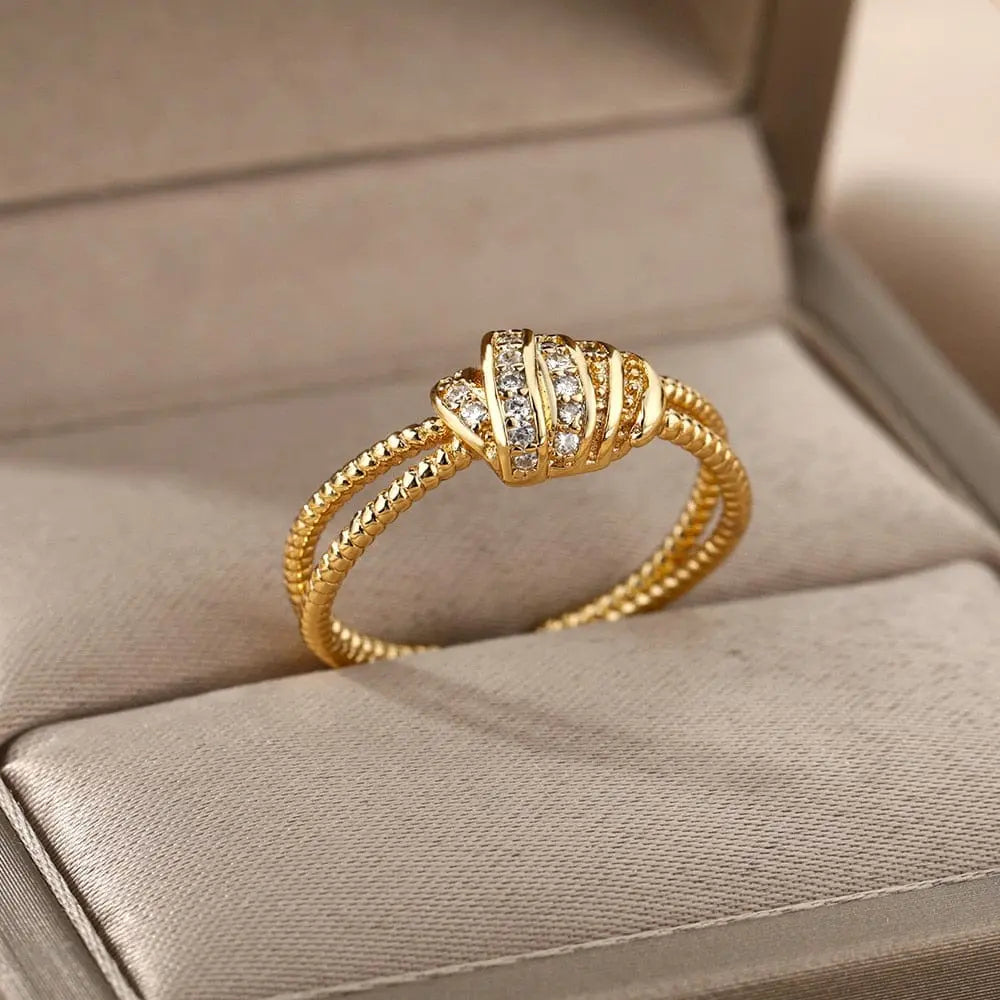 Showlu Store Nation gold stainless steel wedding ring with zircon gemstone, elegant and shiny for women's engagement or wedding jewelry.