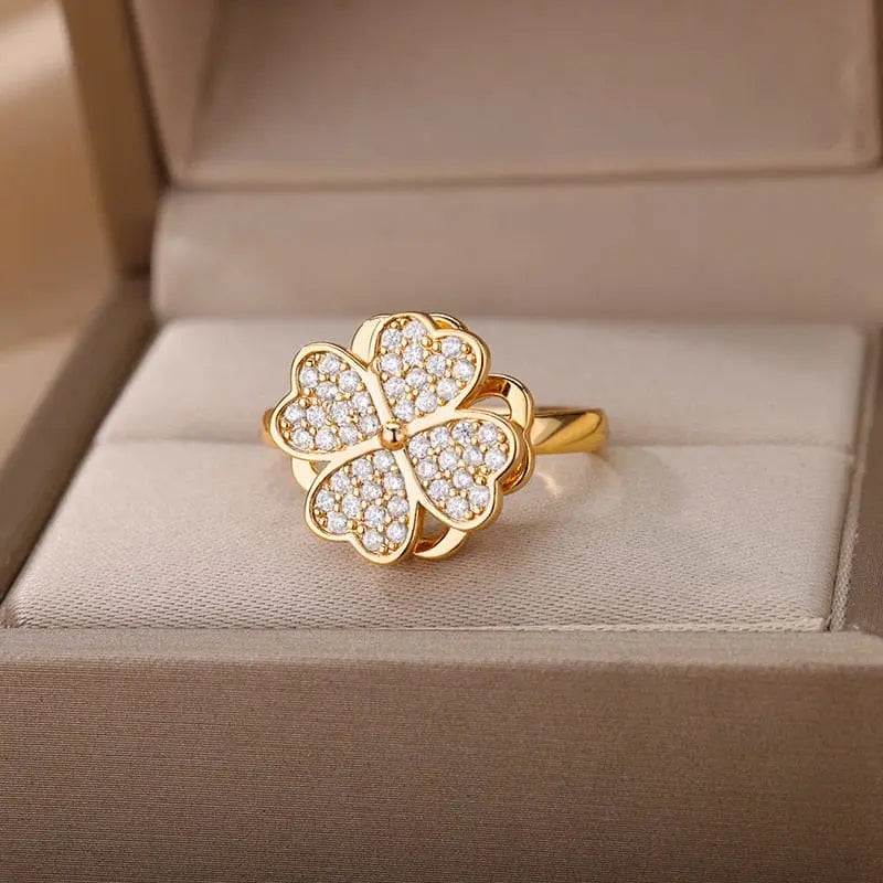 Gold stainless steel wedding ring with zircon accents from Showlu Store Nation, suitable for engagement or special occasions.